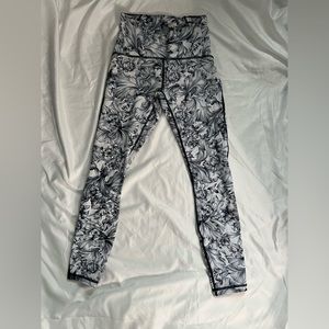 Lululemon Leggings. Black and white floral capri leggings. Size 4